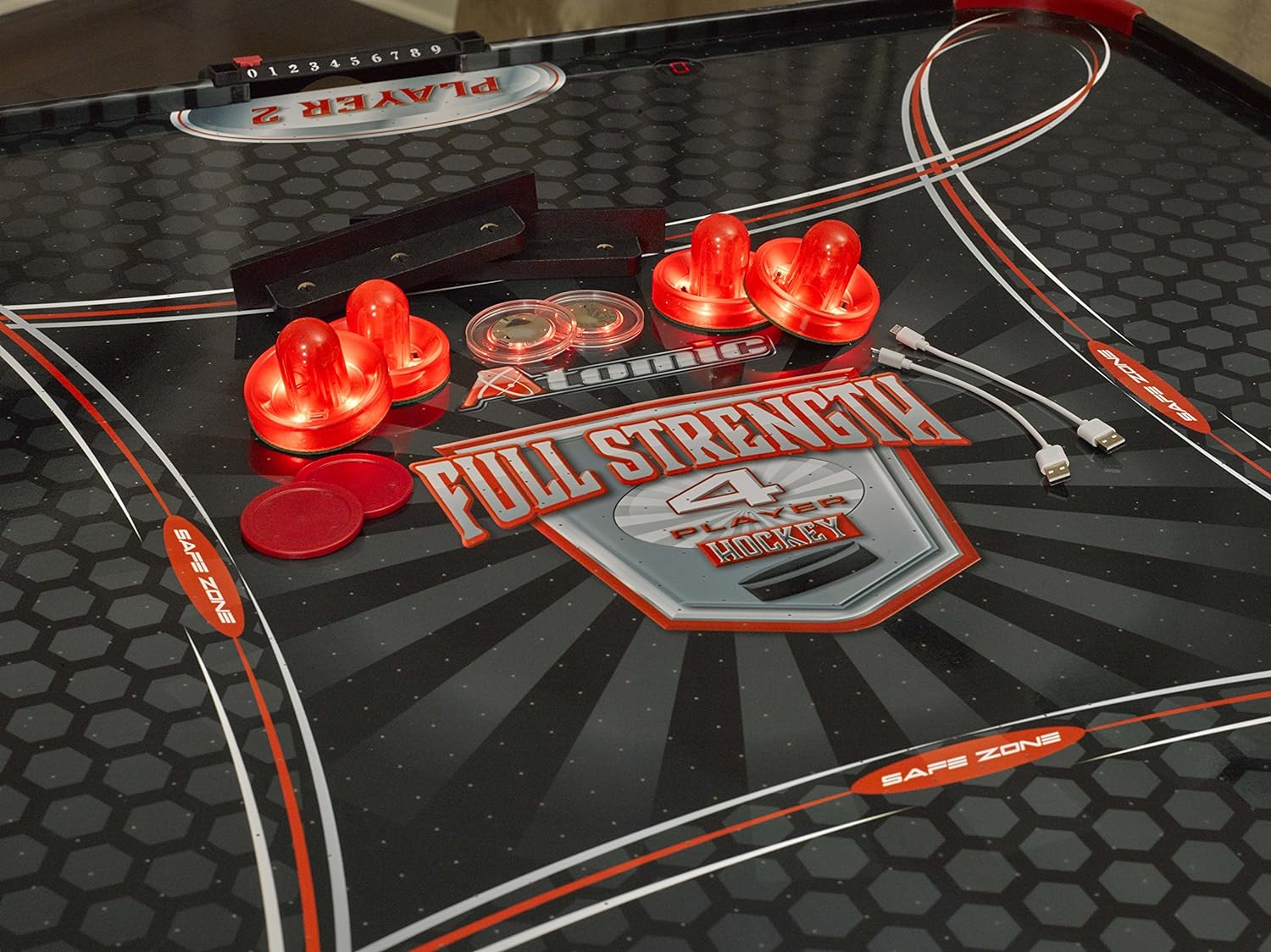 Playing surface of Atomic Full Strength 4-player Air Hockey Table